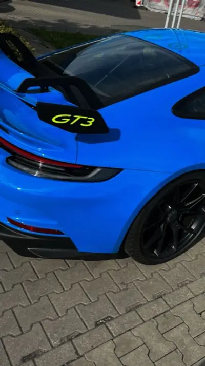 Синій Porsche 911 GT3, вигляд ззаду